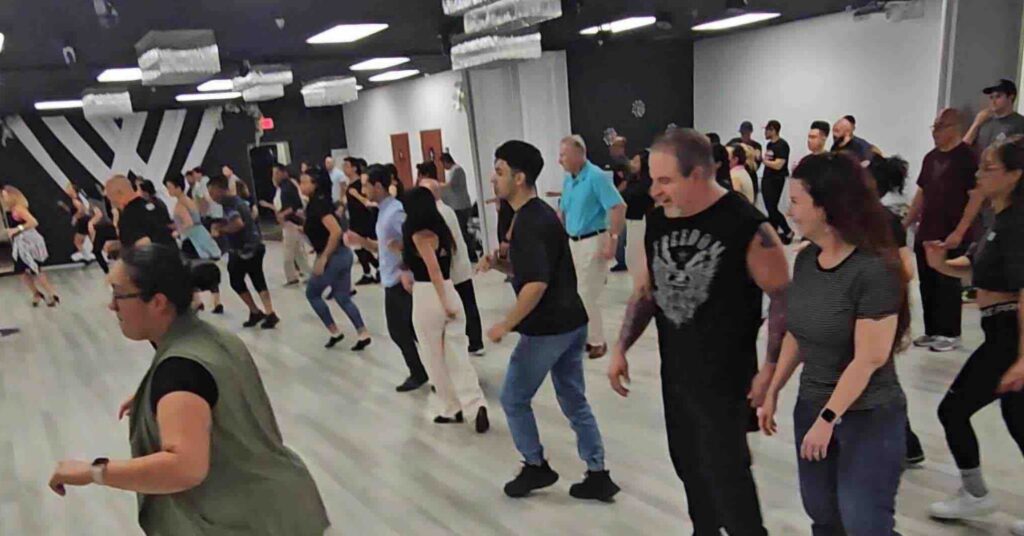 Warm Up dance before group sals class at OC salsa in Fountain Valley